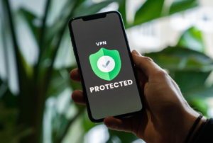 Person holding a VPN-protected phone.