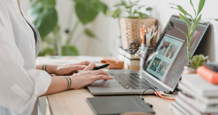 A woman working on a laptop