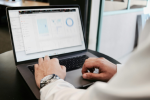 A person analyzing data on a laptop