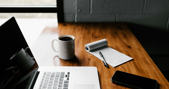 notebook and coffee with devices