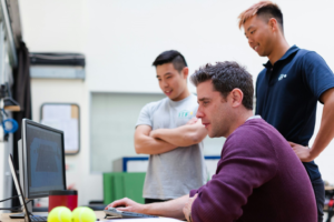 three forensic engineers analyzing data