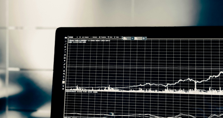 A laptop screen displaying forensic audio analysis