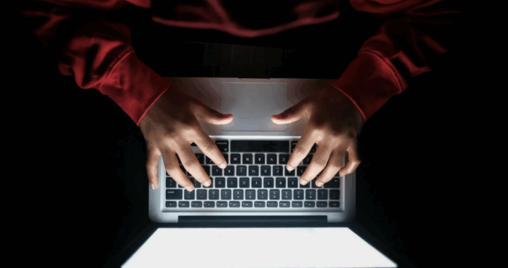 A forensic audio specialist at work.