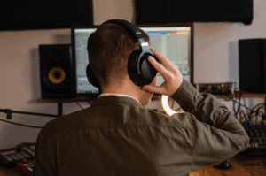 Audio forensic specialist and video enhancement expert reviewing digital evidence