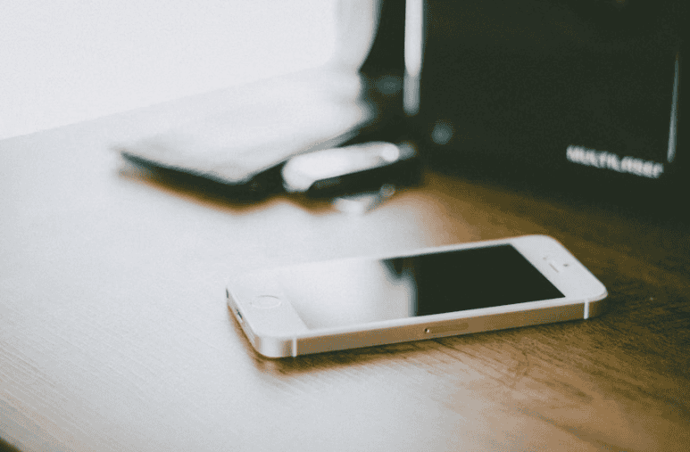 A mobile device on a table.