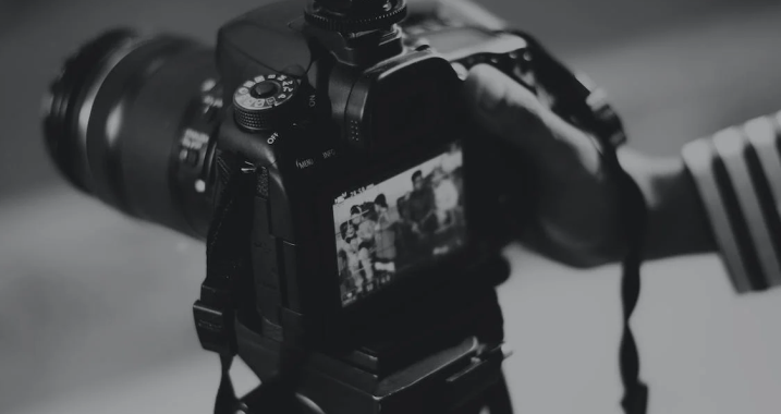 Close-up of a DSLR camera screen displaying recorded footage during review