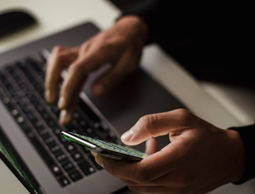 a person using a laptop.