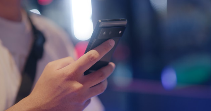 a person holding a smartphone.